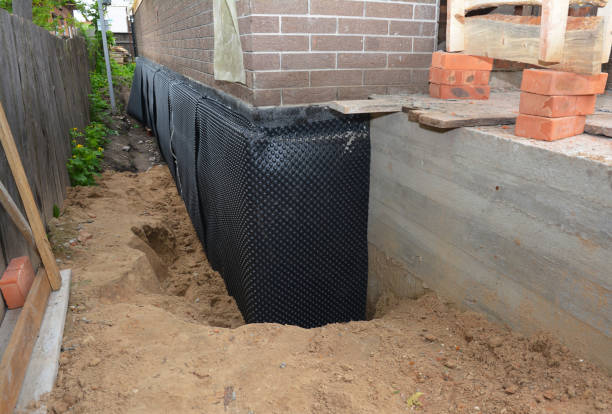 Happy homeowners after waterproofing job in Penn Yan